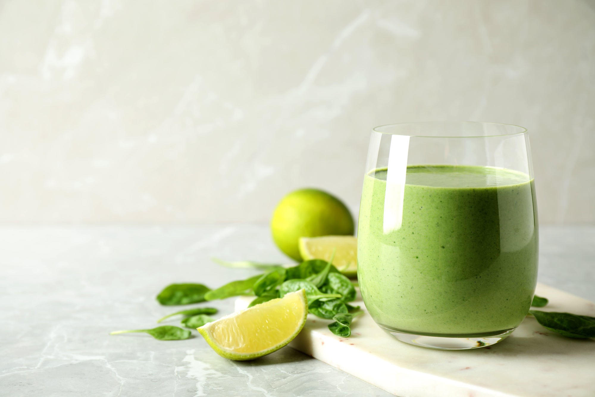 green smoothie with raspberry for Monday reset