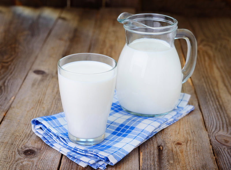 glass jar and cup of milk