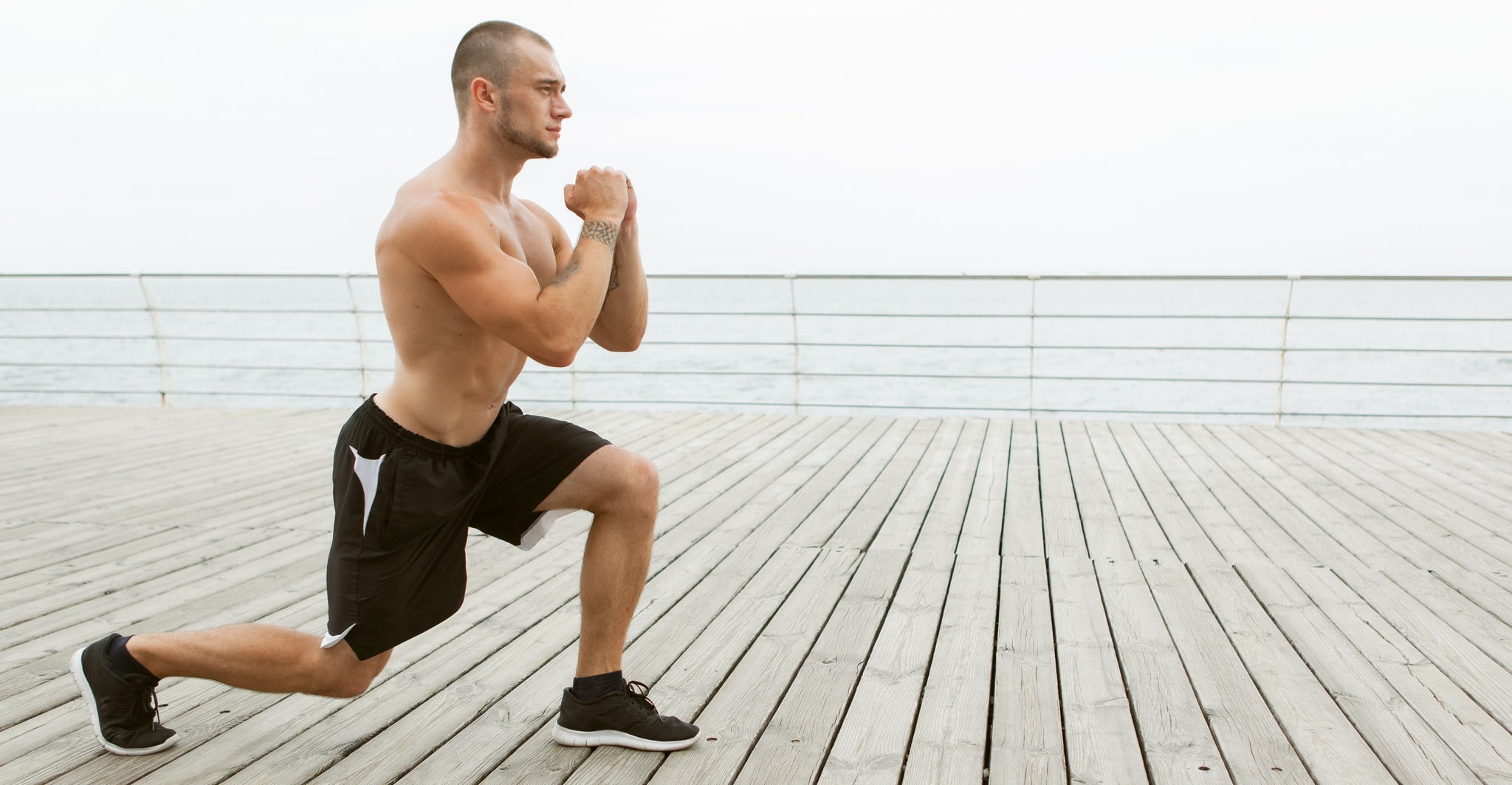 man performing bodyweight lunges