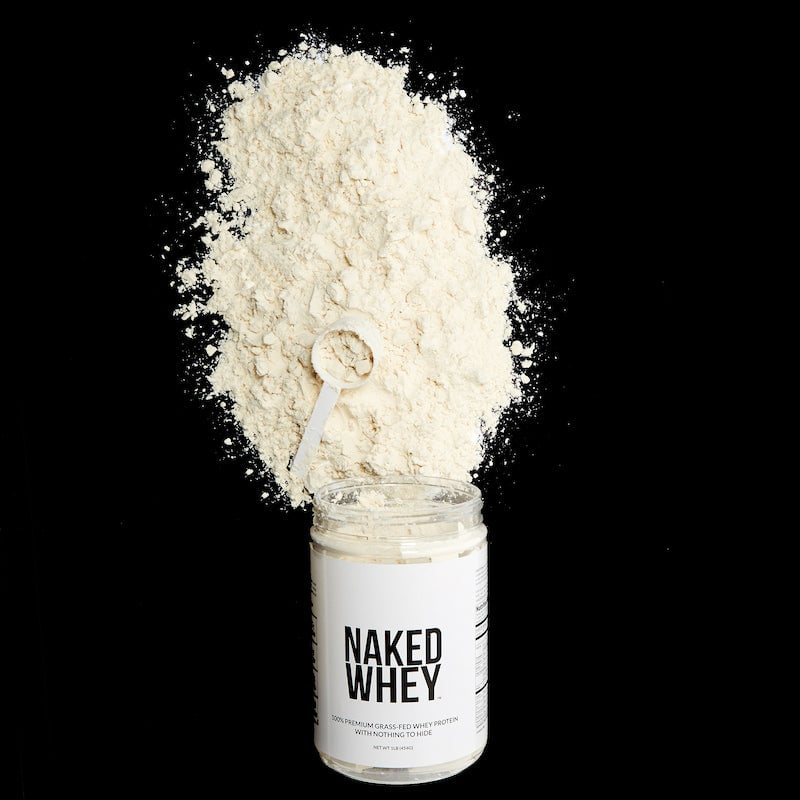 Naked Whey product image against a black background