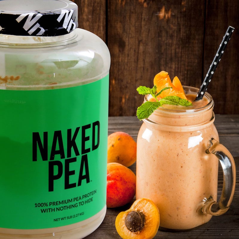 Naked Pea product next to a fruit protein shake